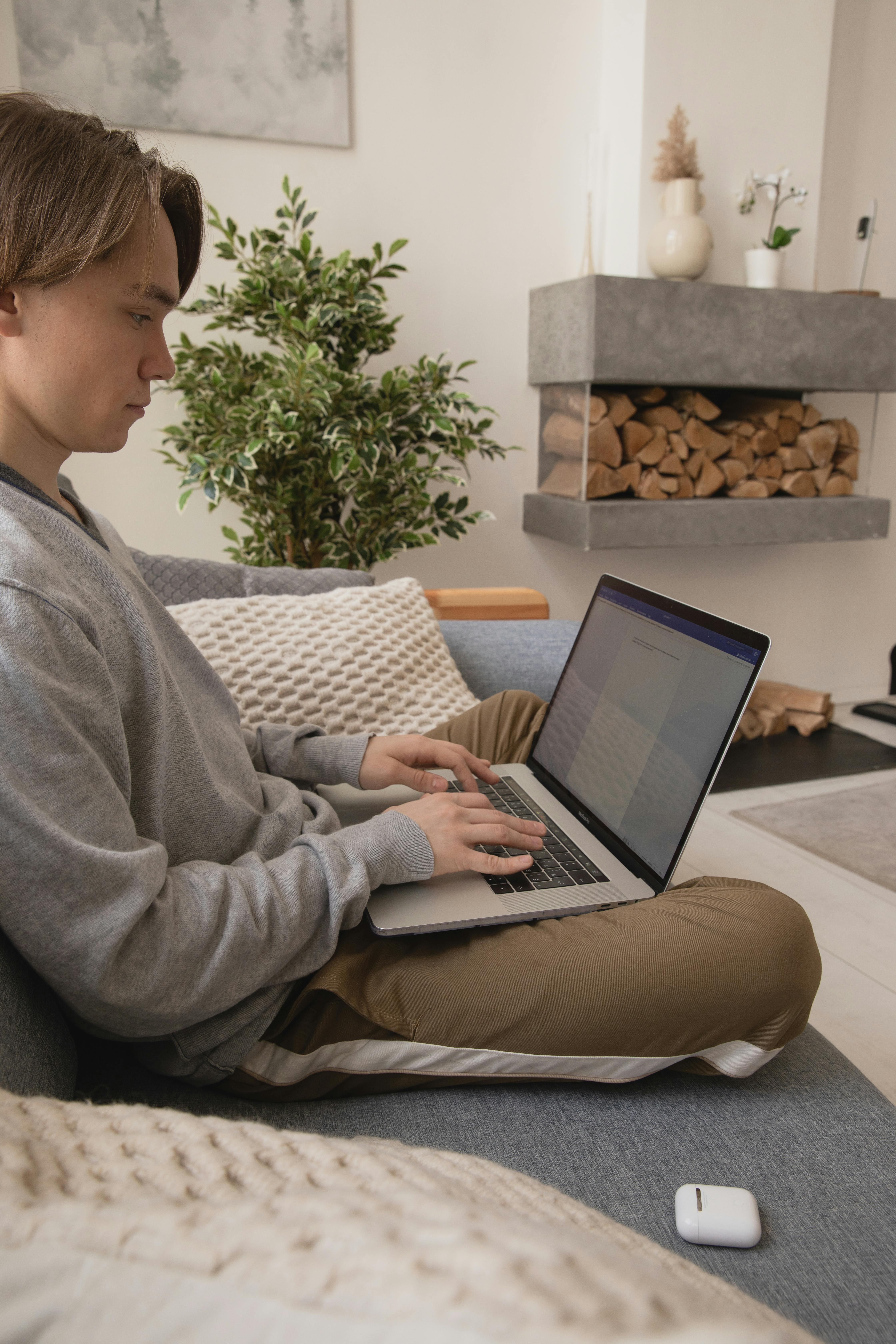 Person typing on laptop